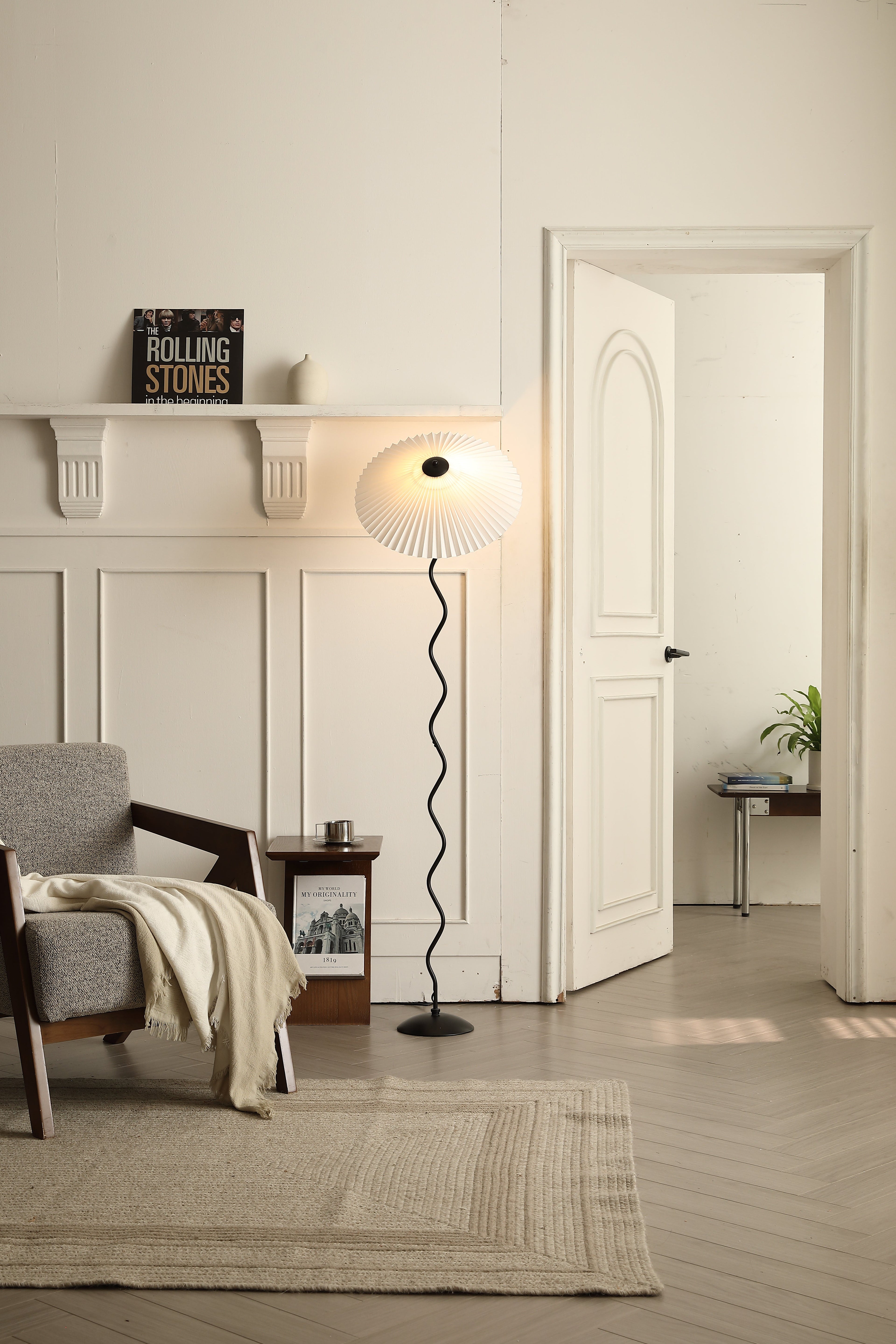 Japanese style Serenity glow paper floor lamp in a sun-filled room.