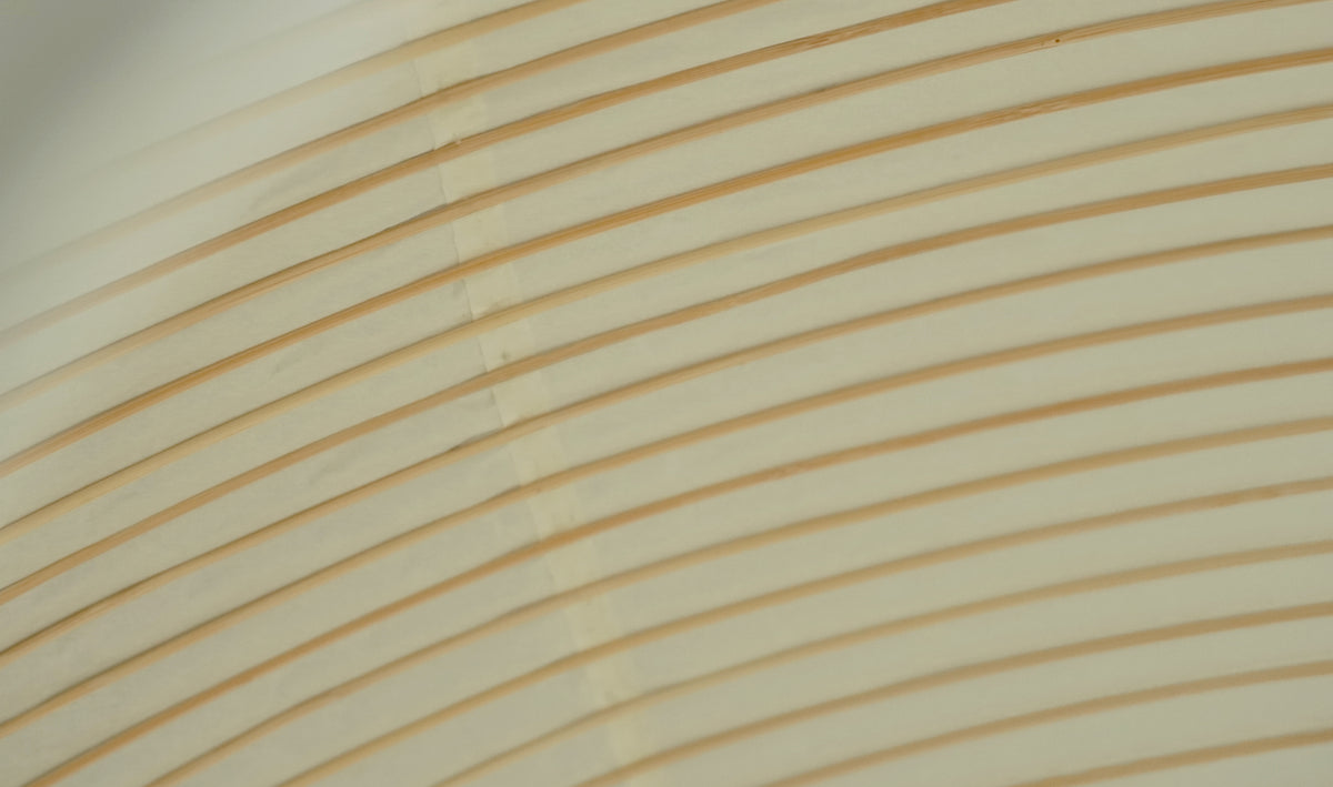 Close-up of the washi paper and hand-ribbed bamboo on the Luna shade