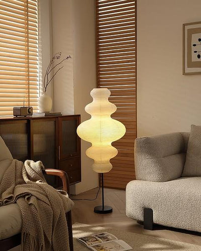 Hüga ribbed floor lamp in a living room