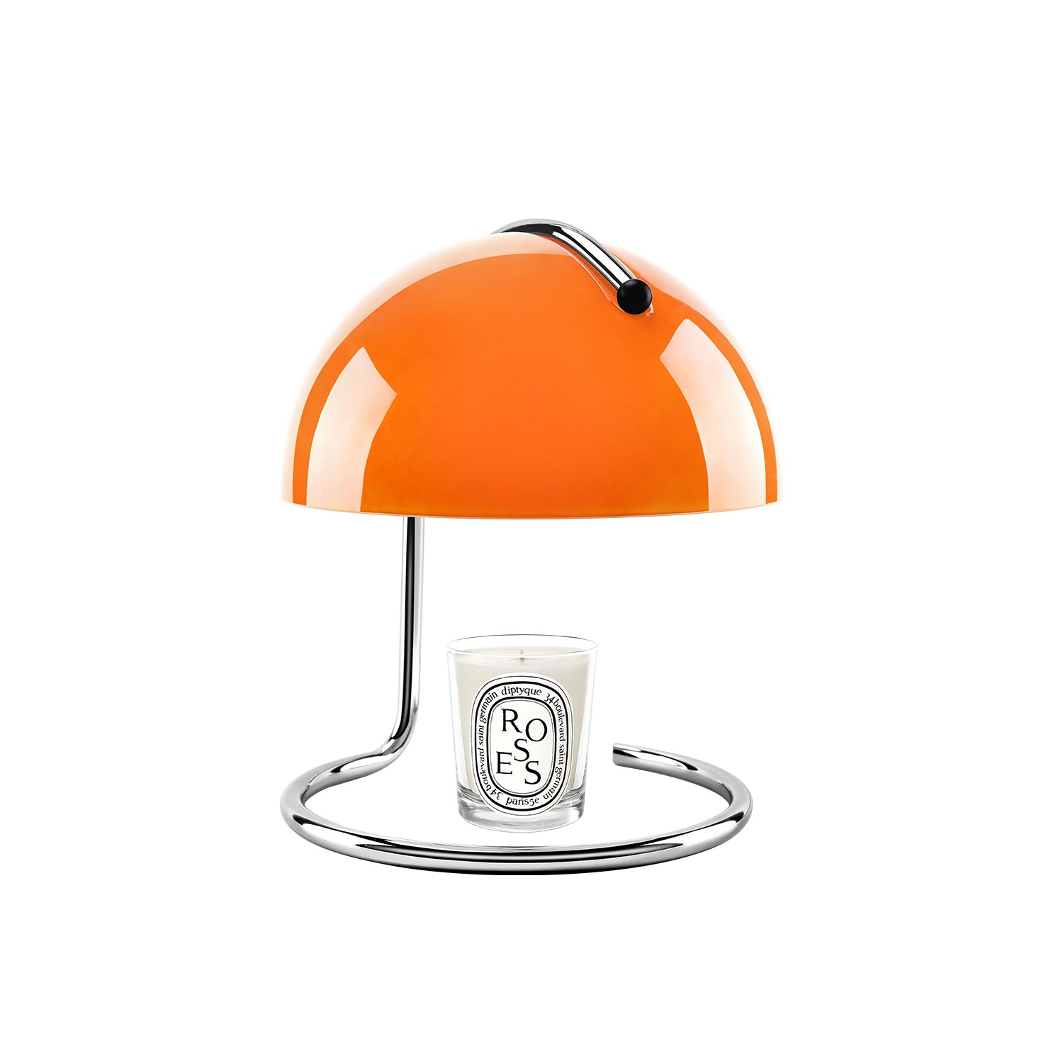 Sculptural dome candle warmer lamp by Hüga Collective Orange sculptural dome candle warmer lamp positioned over a candle in a minimal design