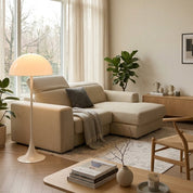 Mushroom floor lamp with a white domed shade and slim stem